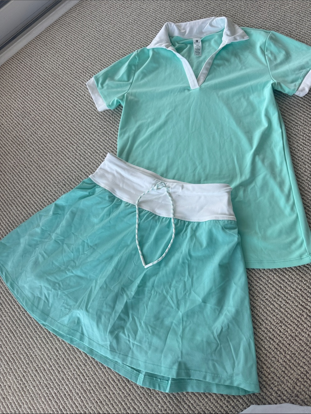 90 Degree By Reflex Mint Green and White tennis or pickleball outfit.